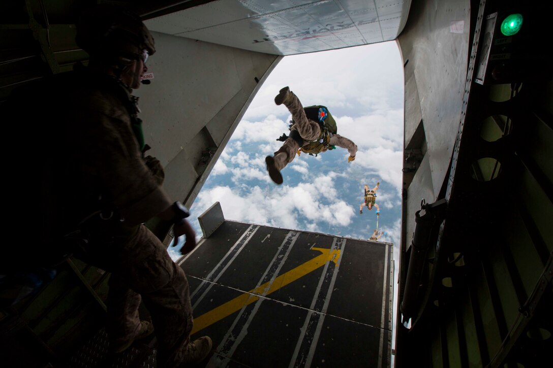U.S. Marines assigned to Force Reconnaissance Platoon, Maritime Raid Force, 26th Marine Expeditionary Unit (MEU), conduct a high altitude low opening (HALO) jump during category 3 sustainment training in Louisburg, N.C., June 2, 2015. The training allowed the Marines to practice proper techniques and procedures while in preparation for deployment to the 5th and 6th Fleet area of responsibility later this year. (U.S. Marine Corps photo by Cpl. Andre Dakis/26th MEU Combat Camera/Released)