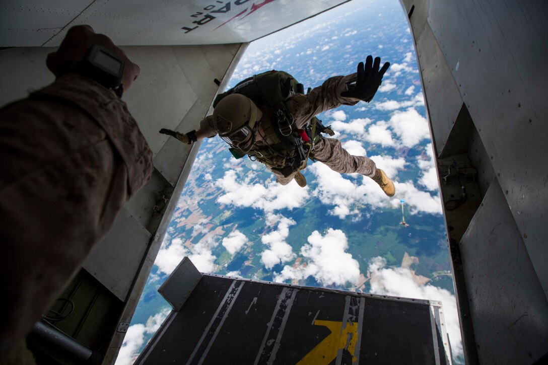 U.S. Marines assigned to Force Reconnaissance Platoon, Maritime Raid Force, 26th Marine Expeditionary Unit (MEU), conduct a high altitude low opening (HALO) jump during category 3 sustainment training in Louisburg, N.C., June 2, 2015. The training allowed the Marines to practice proper techniques and procedures while in preparation for deployment to the 5th and 6th Fleet area of responsibility later this year. (U.S. Marine Corps photo by Cpl. Andre Dakis/26th MEU Combat Camera/Released)