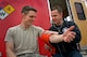Daniel Conrad, Grissom Fire Department firefighter, checks blood pressure of Staff Sgt. Mitchell Birdsong, 60th Civil Engineer Squadron emergency management specialist from Travis Air Force Base, Calif., during All-hazards, Tactics and Applications for Comprehensive Knowledge and Understanding course at Grissom Air Reserve Base, Ind., May 19, 2015. During the course, 434th Air Refueling Wing fire department, services, security forces, aircraft maintenance and logistics pulled together to meet requirements needed to host the event. (U.S. Air Force photo/Tech. Sgt. Benjamin Mota)