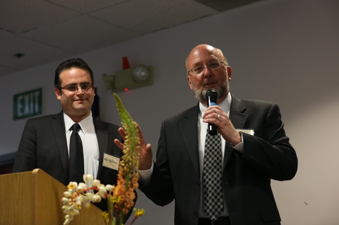 Robert Kard, director of the San Diego County Air Pollution Control District, speaks at the Environmental Act and Restoration that Helps awards ceremony shortly before presenting the Clean Air Award to Marine Corps Air Station Miramar in San Diego, May 28.