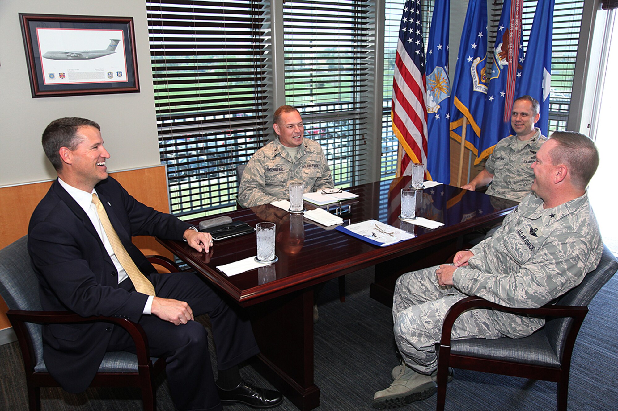 William E. Marion II, Deputy Director, Plans and Integration, the Pentagon, Washington, D.C., meets with Brig. Gen. Samuel "Bo" Mahaney, Air Reserve Personnel Center commander, Brig. Gen. Steven Rosenmeier, Director of Personnel within the Office of Air Force Reserve, Washington, D.C., and Col. Sean McElhaney-Pahia, ARPC vice commander, during his visit to ARPC June 4, 2015, on Buckley Air Force Base, Colo. (U.S. Air Force photo/Quinn Jacobson)