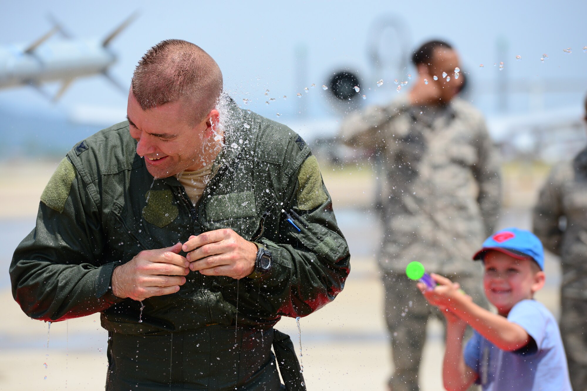 Col. Brook Leonard, 51st Fighter Wing commander, took his final flight at Osan Air Base, Republic of Korea, June 4, 2015. Leonard was gleefully soaked with the traditional water by his children.
(USAF photo by Staff Sgt. Amber Grimm)