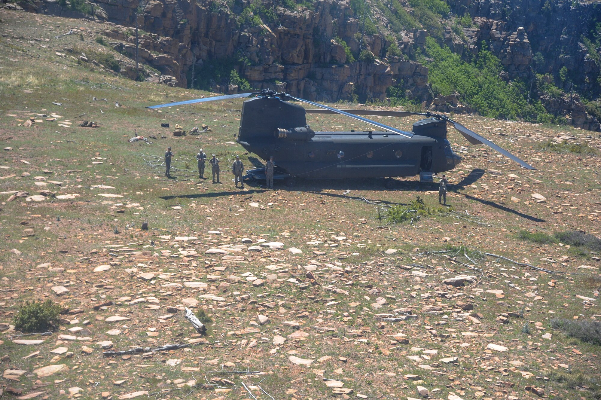 U.S. Army Soldiers monitor the landing area of a CH-47D Chinook during Angel Thunder 2015 at Mongollon Rim, Ariz., June 3, 2015. Angel Thunder is the largest personnel recovery exercise in the world combining joint, coalition and interagency personnel. Participants will train through the full spectrum of personnel recovery capabilities with numerous types of aircraft. (U.S. Air Force photo by Senior Airman Betty R. Chevalier/Released)