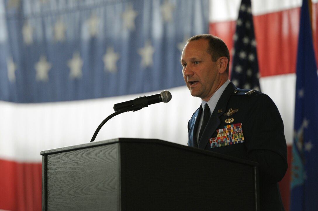 Col. Gentry Boswell, 28th Bomb Wing commander, addresses Ellsworth Airmen during a change of command ceremony at Ellsworth Air Force Base, S.D., June 4, 2015. Boswell has served a total of eight years of his Air Force career at Ellsworth and was recently the vice wing commander. He returns to lead the wing after a one year assignment to the Pentagon. (U.S. Air Force photo by Senior Airman Hailey R. Staker/Released)