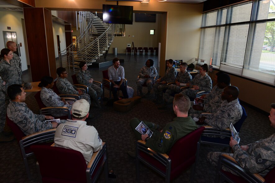 Singer/songwriter Ray Johnston visits with Airmen at the 2nd Mission Support Group as a part of the American 300 Tour on Barksdale Air Force Base, Louisiana, June 3, 2015. American300 is a volunteer organization designed to increase the resiliency capabilities of American armed forces members, their families and the areas which they live and operate in around the world. (U.S. Air Force photo/Airman 1st Class Luke Hill)