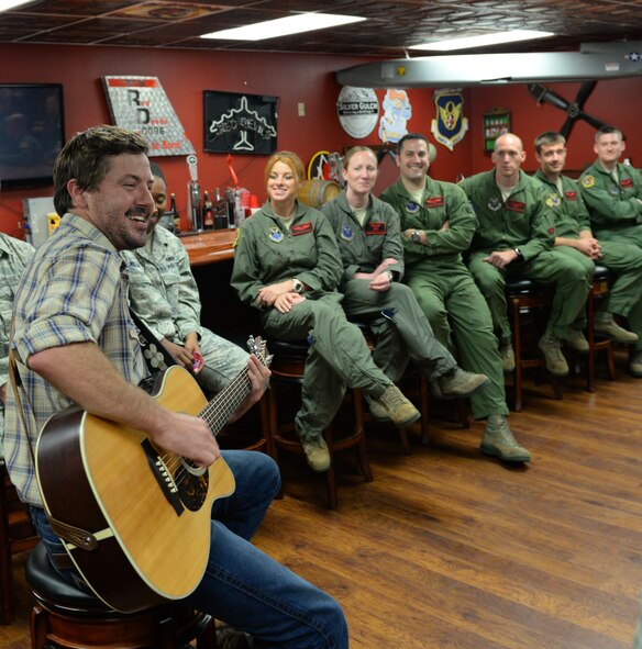 Ray Johnston, American 300 guest, plays his song "No Bad Days" for 96th Bomb Squadron Airmen on Barksdale Air Force Base, Louisiana, June 2, 2015. After being diagnosed with a rare form of leukemia, Johnston's take on life is that as long as you're breathing, there can be no bad days. American 300 is an all-volunteer, non-profit organization designed to increase morale and resilience of American armed forces members around the world by connecting them with resilient people who have powerful stories to share. (U.S. Air Force photo/Airman 1st Class Curt Beach)