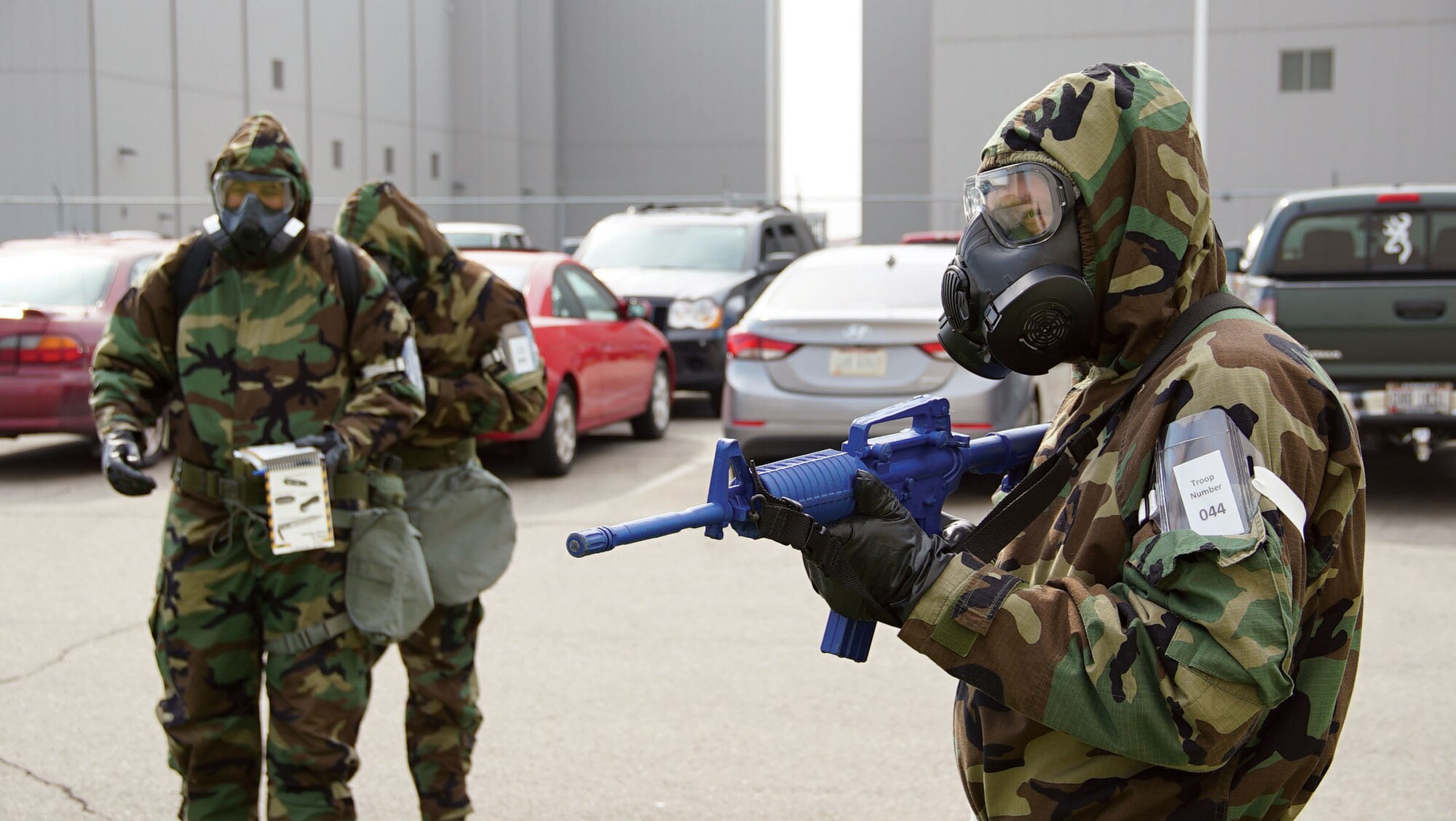 WRIGHT-PATTERSON AIR FORCE BASE, Ohio – Airmen with the 445th Airlift Wing perform a Post Attack Reconnaissance (PAR) sweep during a post-attack scenario for the Buckeye Storm exercise May 3, 2015. The team performed PAR sweeps involving exiting the safety of the bunker to search for Unexploded Ordinances (UXOs), casualties and traces of a chemical or biological attack. (U.S. Air Force photo/Senior Airman Devin Long)