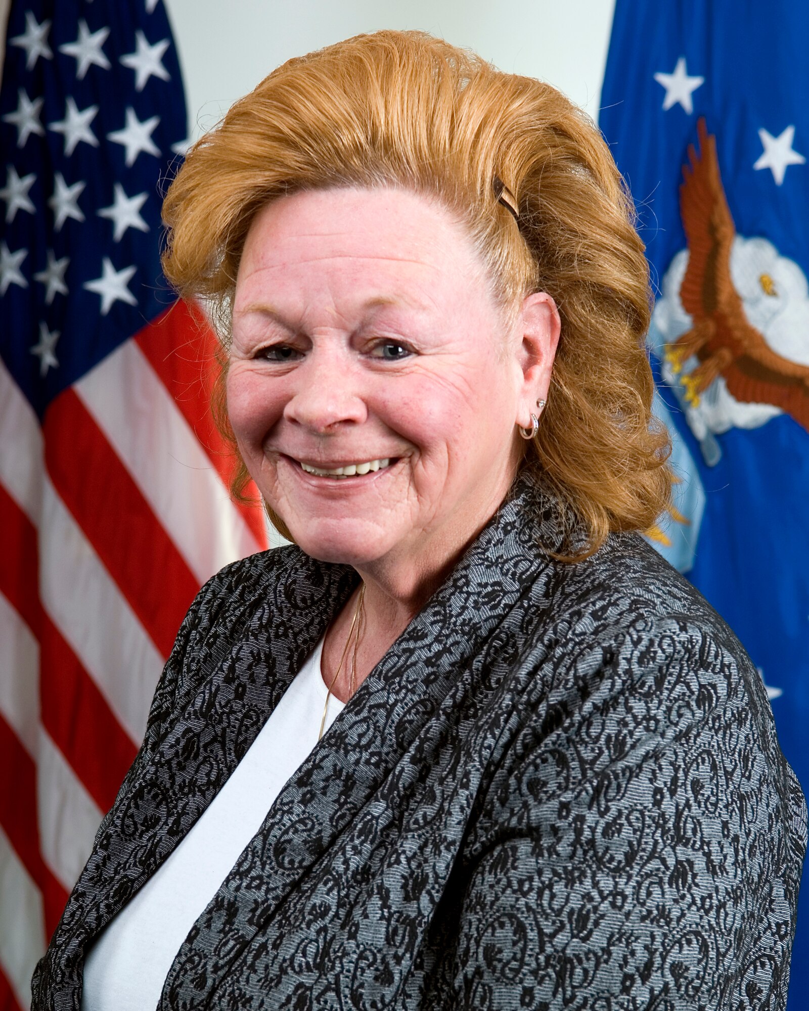 Carole Cann, 434th Logistics Readiness Squadron general supply specialist, poses for an official photo at Grissom Air Reserve Base, Ind., April 16, 2015. Cann was recently named 434th Air Refueling Wing 2014 civilian supervisor of the year for her outstanding work and accomplishments. (U.S. Air Force photo/Tech. Sgt. Doug Hays)