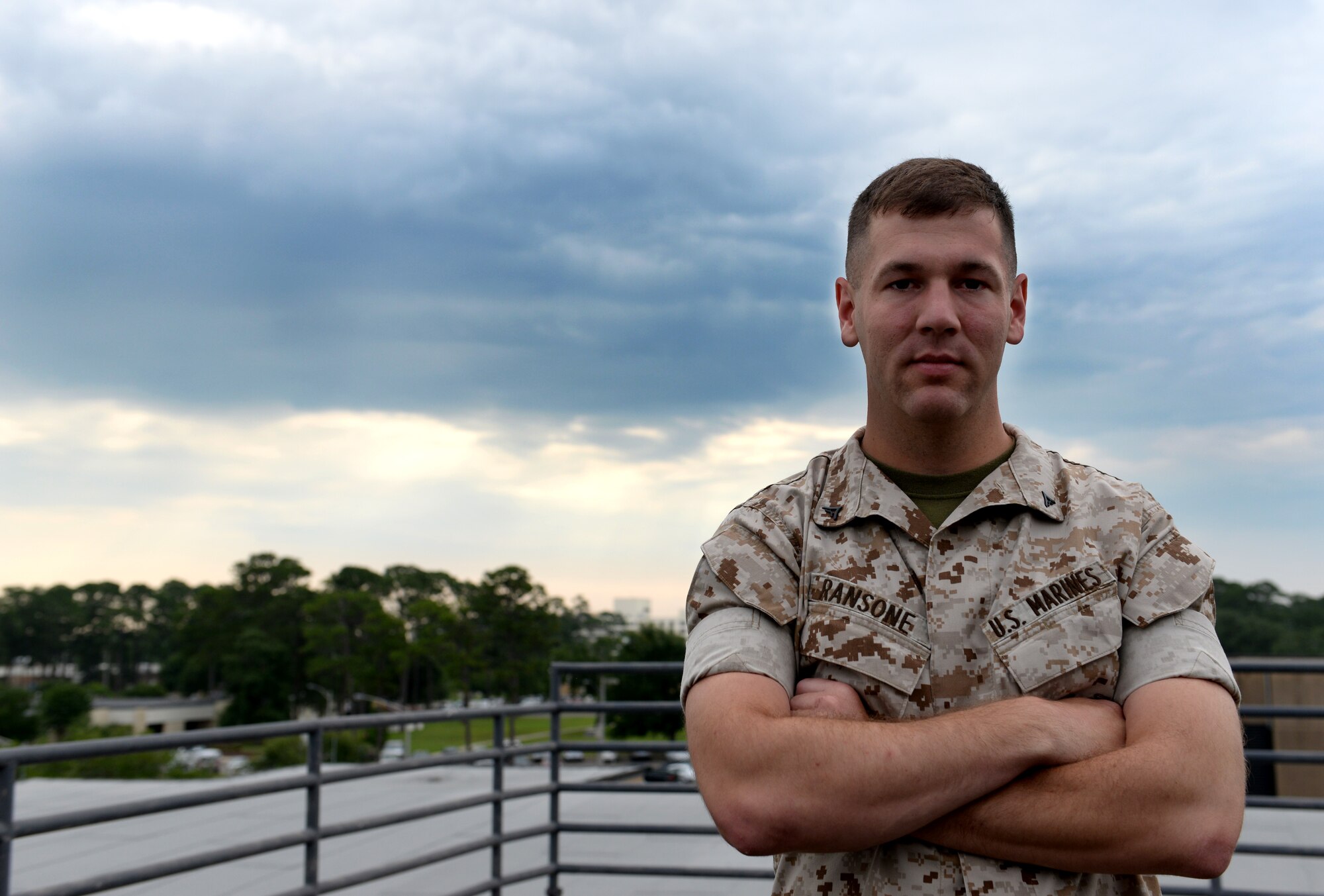U.S. Marine Corps Lance Cpl. Cody Ransone, Keesler Marine Detachment student, poses for a photo outside the Weather Training Complex observatory June 3, 2015, Keesler Air Force Base, Miss. Ransone graduated with a 100 percent average from the Meteorological and Oceanographic Analyst Forecaster course in the 335th Training Squadron, and will continue onto the Marine Unique Course here, where he will learn service-specific duties about his job. (U.S. Air Force photo by Airman 1st Class Duncan McElroy)