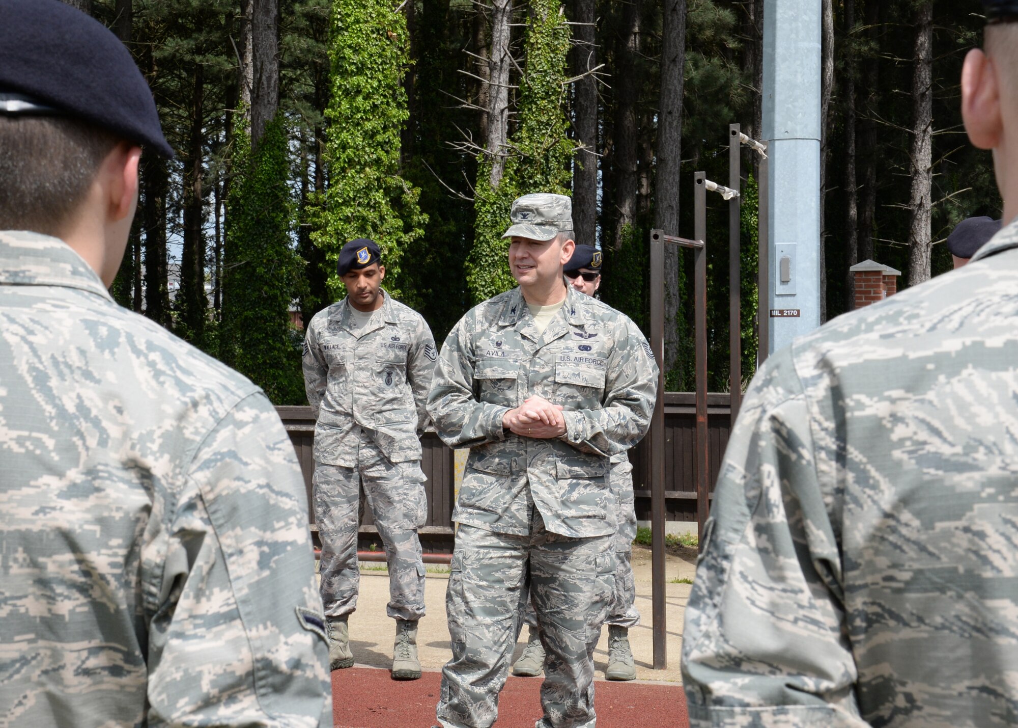 U.S. Air Force Col. David Avila, 100th Mission Support Group commander, thanks participants for their efforts following a “Defender Challenge” hosted May 21, 2015, on RAF Mildenhall, England. The winner of the event was “Team Tomi,” consisting of Military Working Dog handlers. Second place was “Sons of Norris,” and third was “Skunk Apes.” (U.S. Air Force photo by Gina Randall/Released)