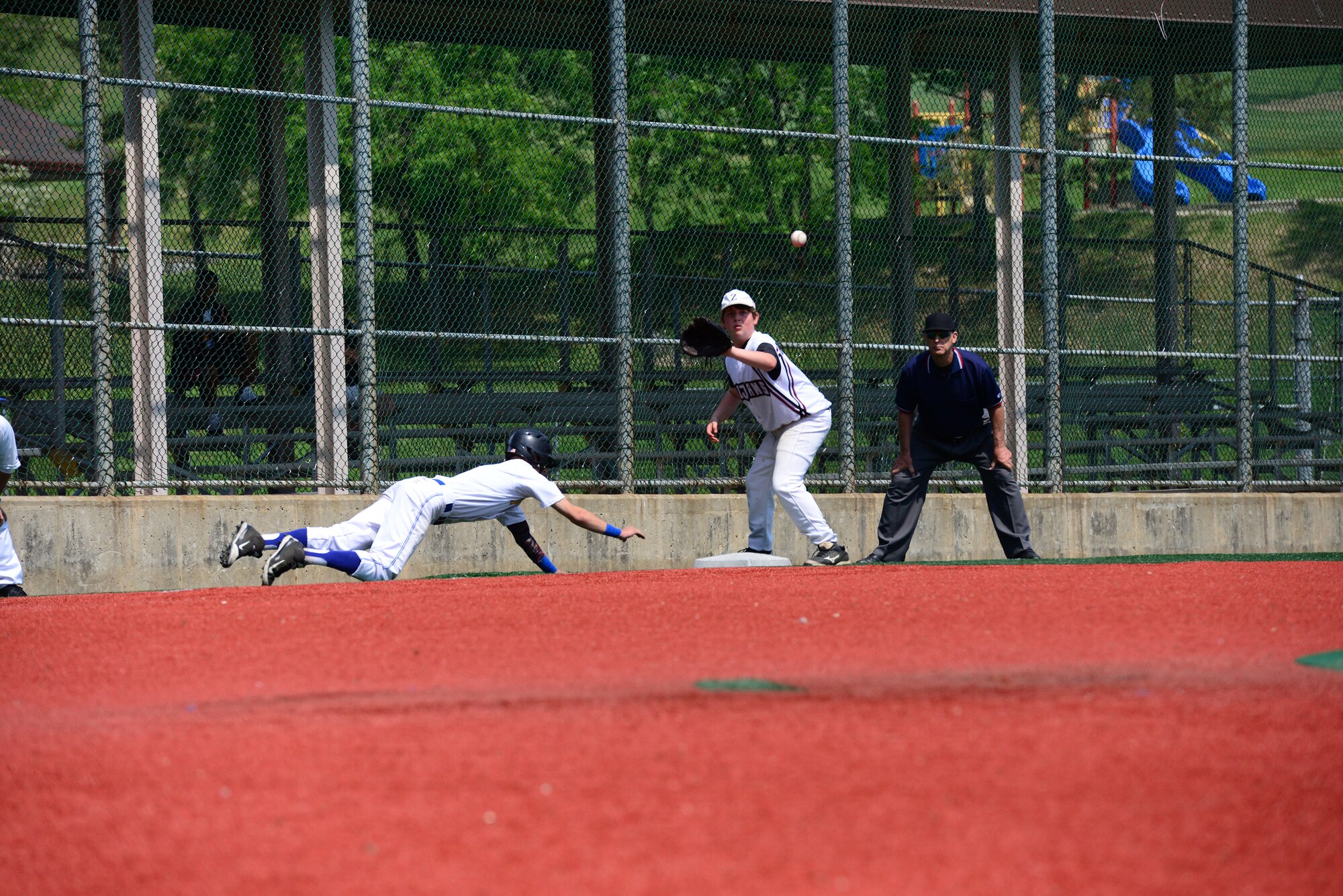 Yokota High School's Panthers of Yokota Air Base, Japan, battle it out with the Zama American High School Trojans from Camp Zama, Japan, in the Pacific Far East Division II baseball tournament at May 20, 2015, at Osan Air Base, Republic of Korea. Yokota won against the defending champions Zama in a double elimination game with a final score of 3-0.
(USAF photo by Staff Sgt. Amber Grimm)