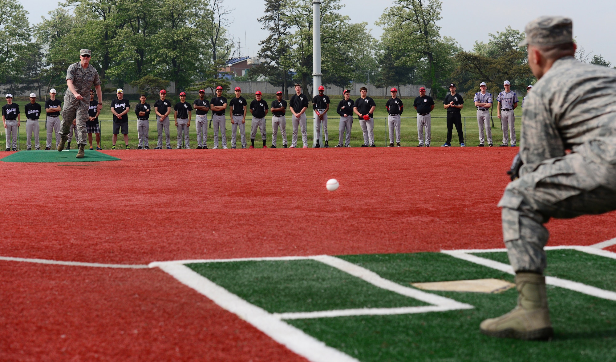 Col. Brian Carr, Vice Commander 51st Fighter Wing, throws out the first pitch of the Pacific Far East Division II baseball tournament held at Osan Air Base, Republic of Korea, May 18-20, 2015. Seven teams from across Japan and Korea came to Osan to compete for the title.  
(USAF photo by Staff Sgt. Amber Grimm)