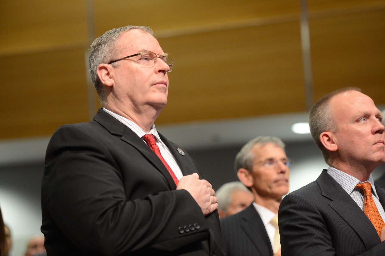 Deputy Defense Secretary Bob Work places his hand over his heart as the national anthem plays during a ceremony inducting Medal of Honor recipients Army Pvt. Henry Johnson and Army Sgt. William Shemin into the Hall of Heroes at the Pentagon, June 3, 2015. President Barack Obama awarded the Medal of Honor posthumously to Johnson and Shemin, who were World War I veterans. DoD photo by U.S. Navy Petty Officer 2nd Class Sean Hurt