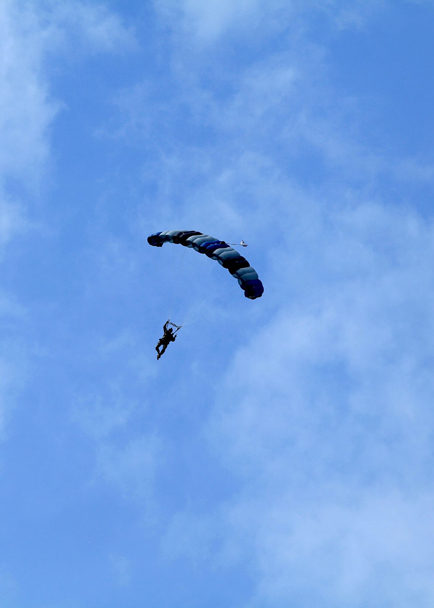 A U.S. Special Operations Command in Europe operator prepares to land just outside of the Mont Saint Michel Abbey in Normandy, France, on May 30, 2015, to commemorate the 71st anniversary of the liberation of France as well as those who served in World War II. Air Commandos assigned to the 321st Special Tactics Squadron, along with other operators within SOCEUR, perform military free fall jumps outside of the U.N. designated world heritage site. (U.S. Army photo by Sgt. 1st Class Will Patterson)