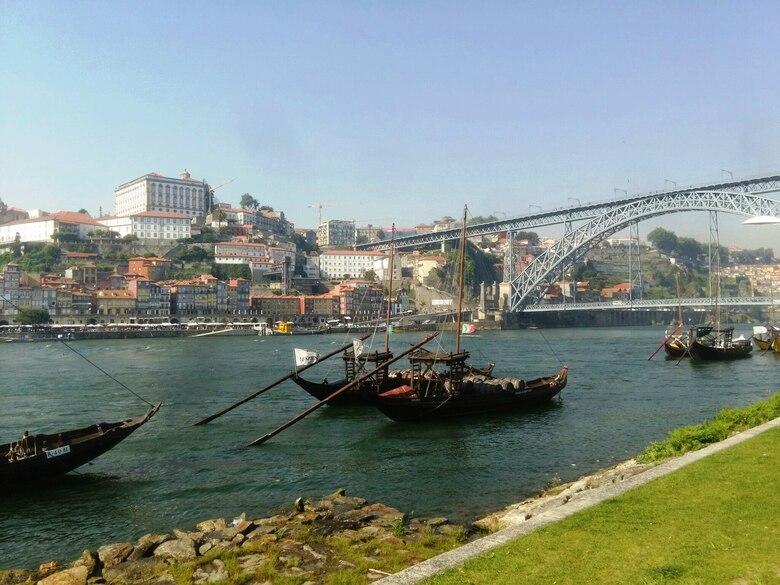 City of Porto with traditional Rabelo boats (originally used to carry Port wine) along the Douro River.