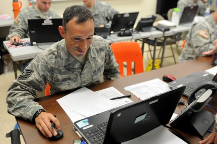 Tech Sgt. Charles E. Brodie works to generate damage assessments in the Joint Task Force 5-0 during the Vigilant Guard/Makani Pahili 2015 exercise. Brodie is working in information operations at JTF 5-0.