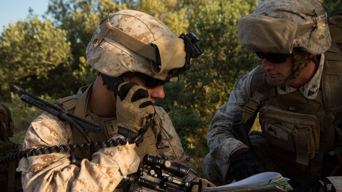U.S. Marine Corps 1st Lt. Matthew Medina, left, a platoon commander with Special-Purpose Marine Air-Ground Task Force Crisis Response-Africa, and Cpl. Drew Blais, a squad leader with SPMAGTF-CR-AF, coordinate with the French infantrymen during a training exercise on Quartier Colonel de Chabrieres, France, May 29, 2015. Marines stationed at Moròn Air Base, Spain, conducted a seize and capture training exercise with the French Foreign Legion’s 6th Light Armored Brigade to further improve interoperability between the two NATO forces as they concurrently deploy their service members to Africa. 