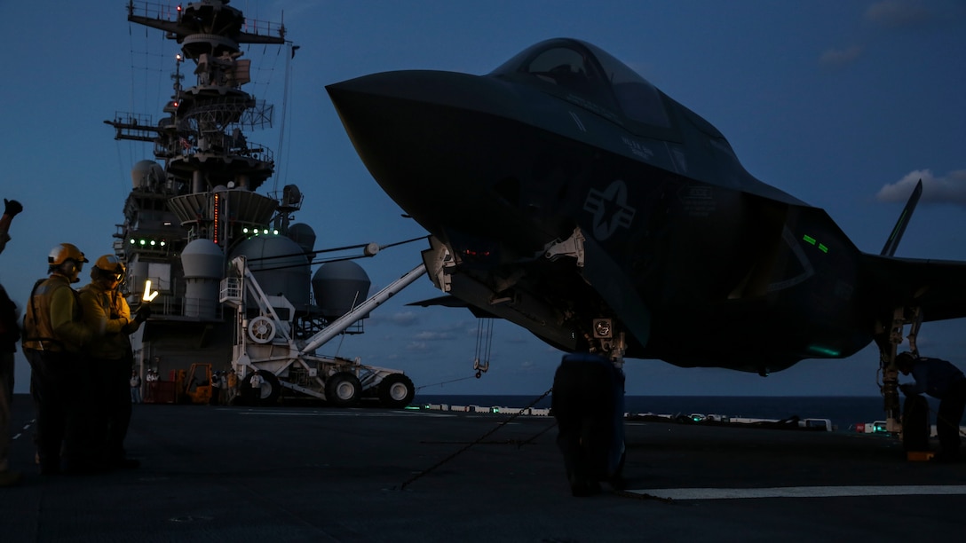Maintenance is performed on an F-35B Lightning II on the flight deck of USS Wasp during night operations, a key component of the Marine Corps’ F-35B operational test May 22. OT-1, scheduled from May 18 through May 29, 2015, is evaluating the full spectrum of the F-35B’s capabilities. The F-35B is with Marine Fighter Attack Squadron 121, Marine Aircraft Group 13, 3rd Marine Aircraft Wing, based in Yuma, Ariz.