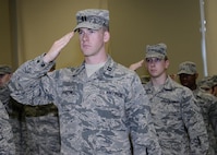 Capt. Blake Hamilton, the 71st Operations Support Squadron Weather Flight commander, renders a salute during the 71st OSS Change of Command ceremony at Vance Air Force Base, Oklahoma, June 4,2015. (U.S. Air Force photo by David Poe)