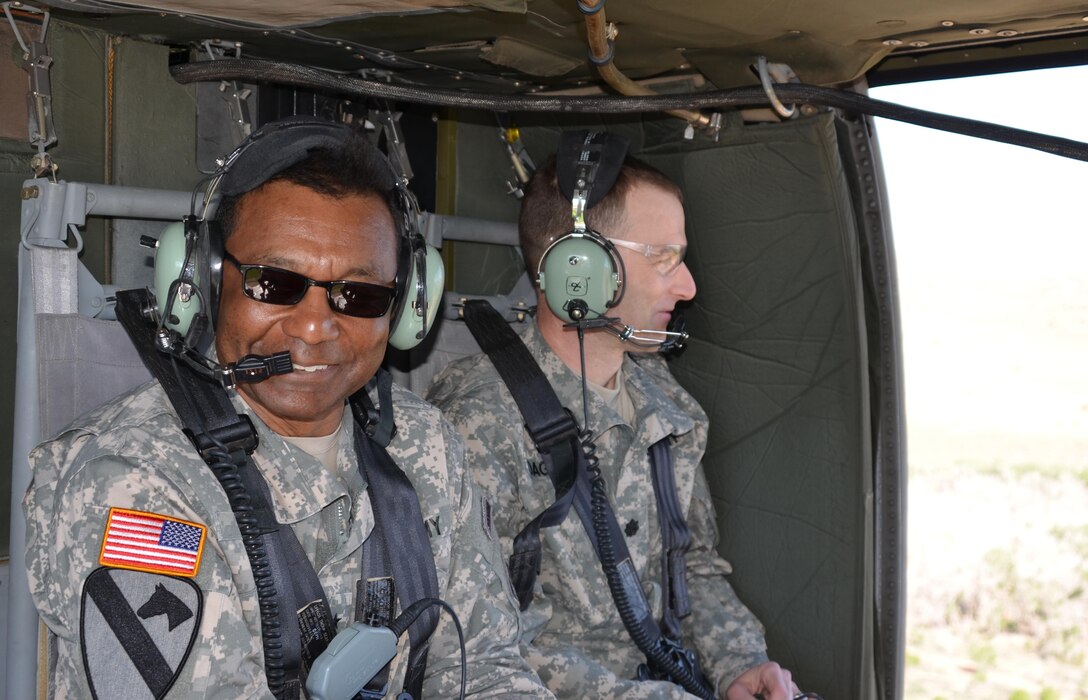 US Army Chief of Engineers and USACE Commanding General Lt. Gen. Thomas Bostick (left) and Albuquerque District Commander Lt. Col. Patrick Dagon took a helicopter tour June 4, 2015, to view work being done to protect Santa Clara Pueblo from increased flood risks caused by the 2011 Las Conchas Fire.   
