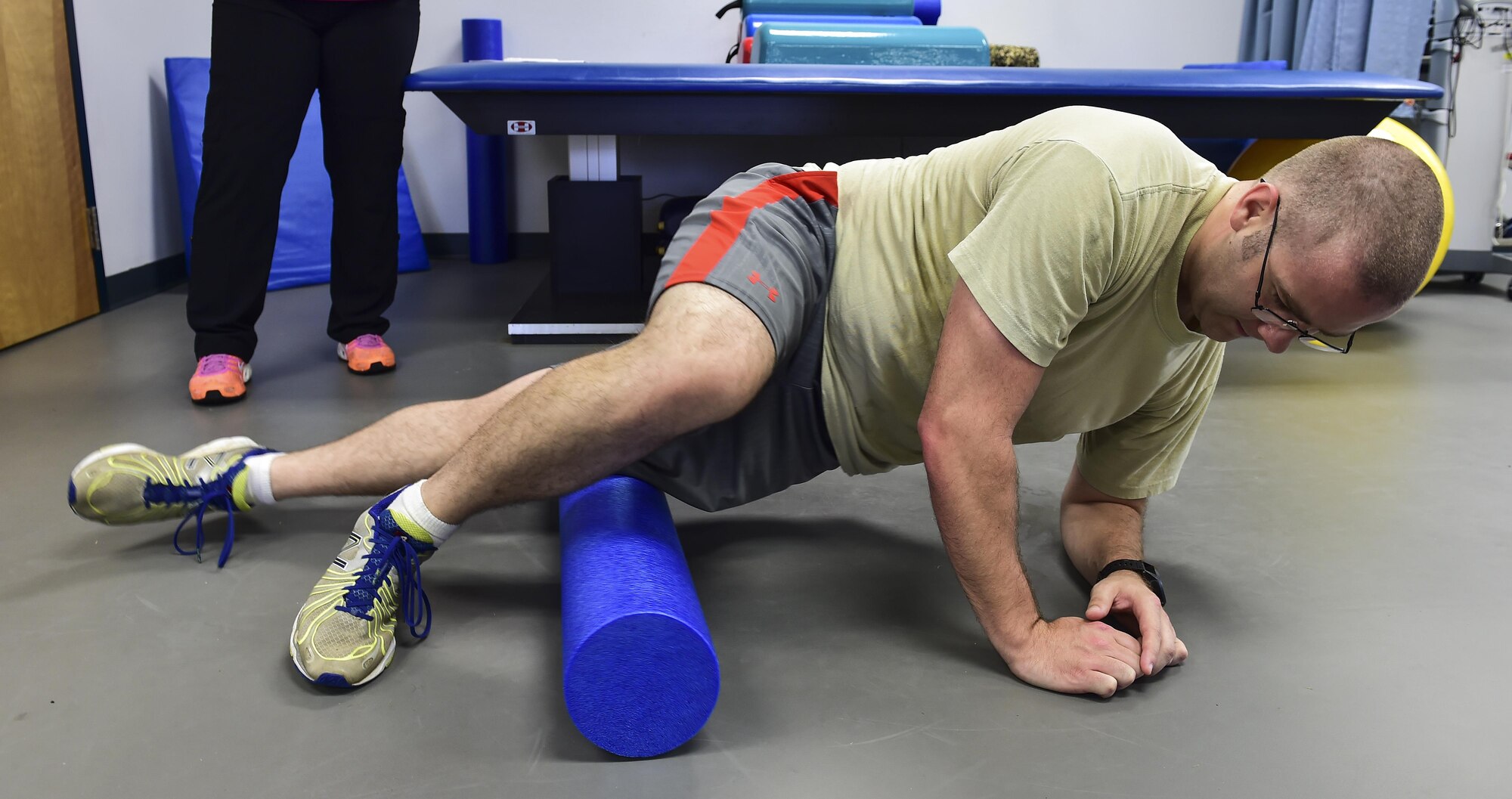 Tech. Sgt. James Kitchen, 413th Flight Test Squadron special missions aviator, uses a foam roller to stretch his quadratic muscles at the physical therapy clinic on Hurlburt Field, Fla., June 5, 2015. Physical therapy primarily focuses on the remediation of injuries and disabilities as well as the promotion of mobility, functional ability, quality of life and movement potential through examination, evaluation, diagnosis and physical intervention. (U.S. Air Force photo/Senior Airman Jeff Parkinson)

