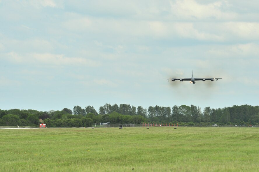 A B-52 Stratofortress assigned to the 5th Bomb Wing, Minot Air Force Base, North Dakota, arrives at Royal Air Force (RAF) Fairford, United Kingdom, June 5, 2015. During the short-term deployment, three Minot-based B-52 bombers, supported by more than 330 Air Force Global Strike Command Airmen, are scheduled to conduct training flights with ground and naval forces around the region and participate in multinational Exercises BALTOPS 15 and SABER STRIKE 15 over international waters in the Baltic Sea and the territory of the Baltic states and Poland. (U.S. Air Force photo by Senior Airman Malia Jenkins/Released) 