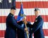 Col. John Nichols, 14th Flying Training Wing Commander, hands the 14th Comptroller Squadron guidon to Maj. Rickey Lott, the new 14th CPTS Commander, at a change of command ceremony June 5 at the Fire Department. (U.S. Air Force Photo/Melissa Doublin)