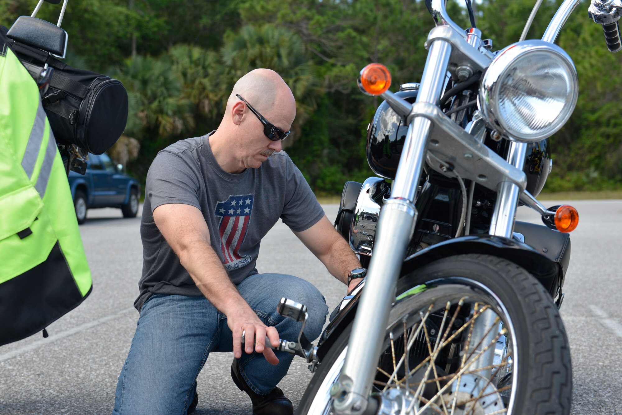 Air Forces Northern Command Chief Master Sgt. Ron Anderson does a visual inspection of his motorcycle. Such inspections help ensure optimum machine performance during a ride. (U.S. Air Force photo released/Tech. Sgt. Ed Staton)