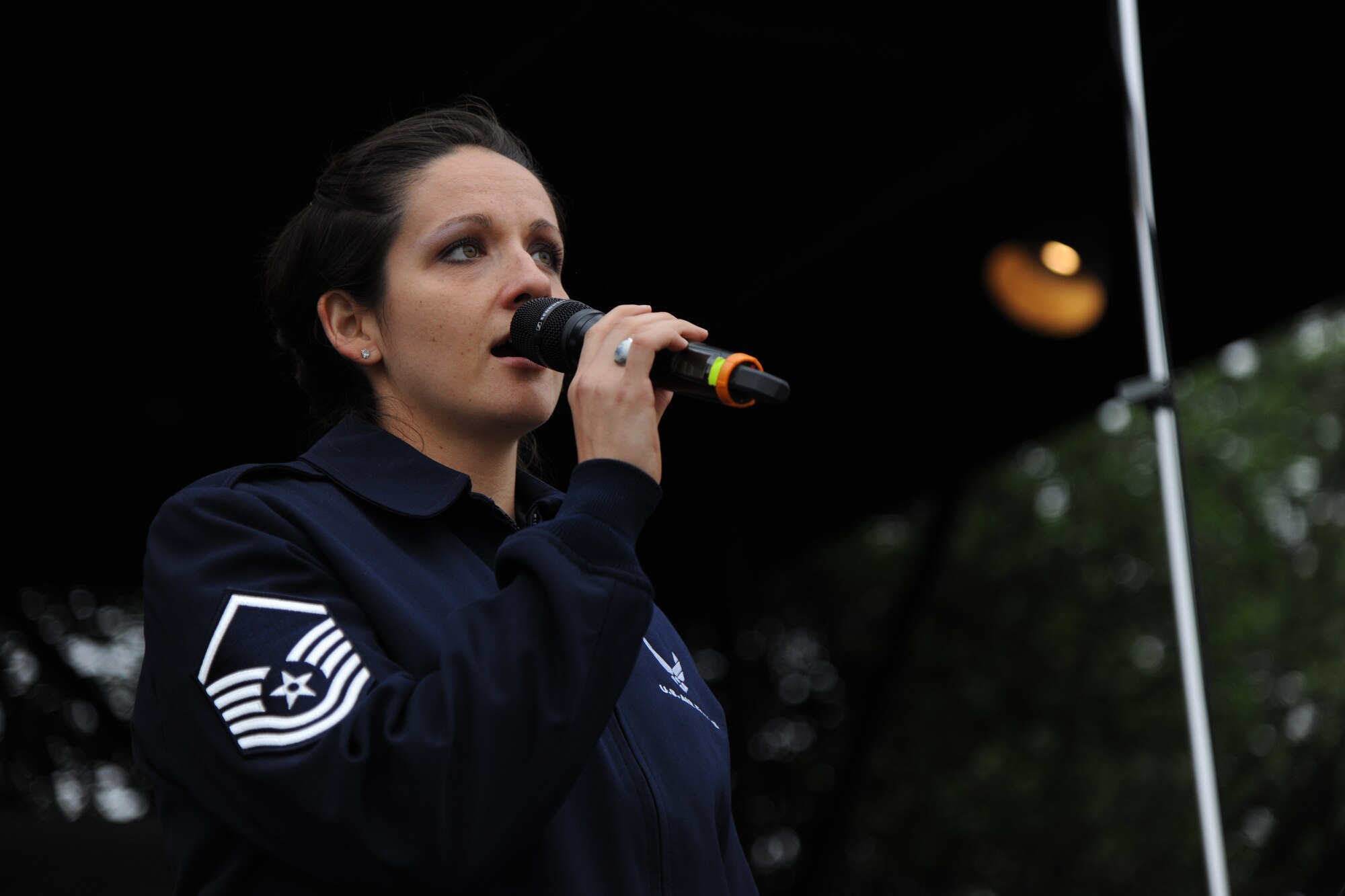 Master Sgt. Emily Wellington, U.S. Air Force Band singing sergeant, sings at the Sylvan Theatre, June 3, 2015. Members of the U.S. Air Force Band’s Concert Band and Singing Sergeants performed a concert at the Sylvan Theatre, District of Columbia, near the Washington Monument. (U.S. Air Force photo/ Airman 1st Class J.D. Maidens)