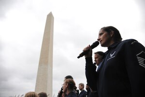 Master Sgt. Emily Wellington, U.S. Air Force Band vocalist, sings at the Washington Monument, June 3, 2015. The U.S. Air Force Band performed a concert at the Sylvan Theatre, District of Columbia. (U.S. Air Force photo/ Airman 1st Class J.D. Maidens)
