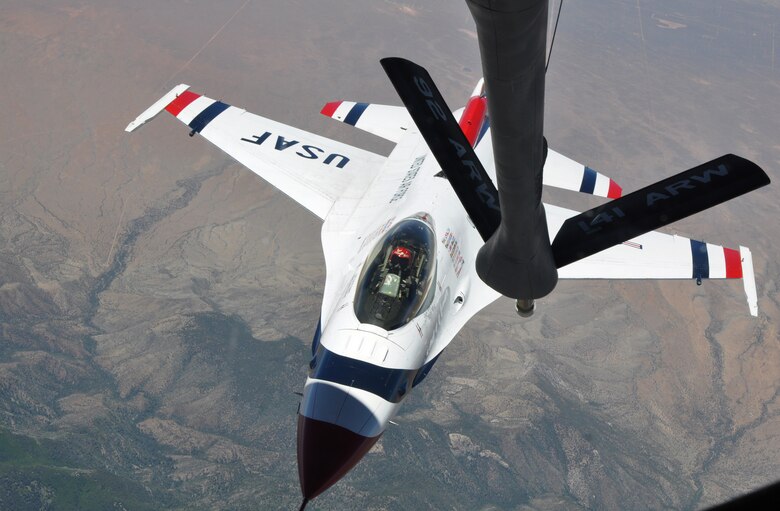 Capt. Alex Goldfein, the right wing pilot for the U.S. Air Force Thunderbirds Air Demonstration Squadron, approaches the boom of a KC-135 Stratotanker assigned to McConnell Air Force Base, Kan., June 4, 2015. The KC-135 provided cross-country air refueling support for the Thunderbirds. The KC-135 aircrew, all Air Force Reservists from the 931st Air Refueling Group, performed fourteen air refueling contacts during the mission. (U.S. Air Force photo by Tech. Sgt. Abigail Klein)
