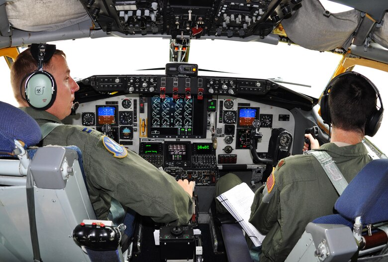 (Left to right) Capt. Brian Doom and Maj. Michael Murphy, 18th Air Refueling Squadron pilots, fly a KC-135 Stratotanker assigned to McConnell Air Force Base, Kan., to provide air refueling support for the Thunderbirds, June 4, 2015. The KC-135 aircrew, all Air Force Reservists from the 931st Air Refueling Group, provided several air refueling missions for the Thunderbirds during the past week.  (U.S. Air Force photo by Tech. Sgt. Abigail Klein)