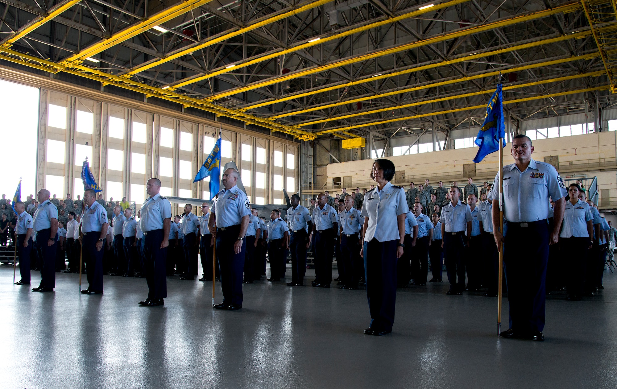 Airmen and civilians make up flights representing the groups of the 96th Test Wing at the wing’s change of command ceremony June 4 at Eglin Air Force Base, Fla.  Col. Christopher Azzano took the reins of the wing from Maj. Gen. David Harris, who leaves to take command of the Air Force Test Center.  (U.S. Air Force photo/Samuel King Jr.)
