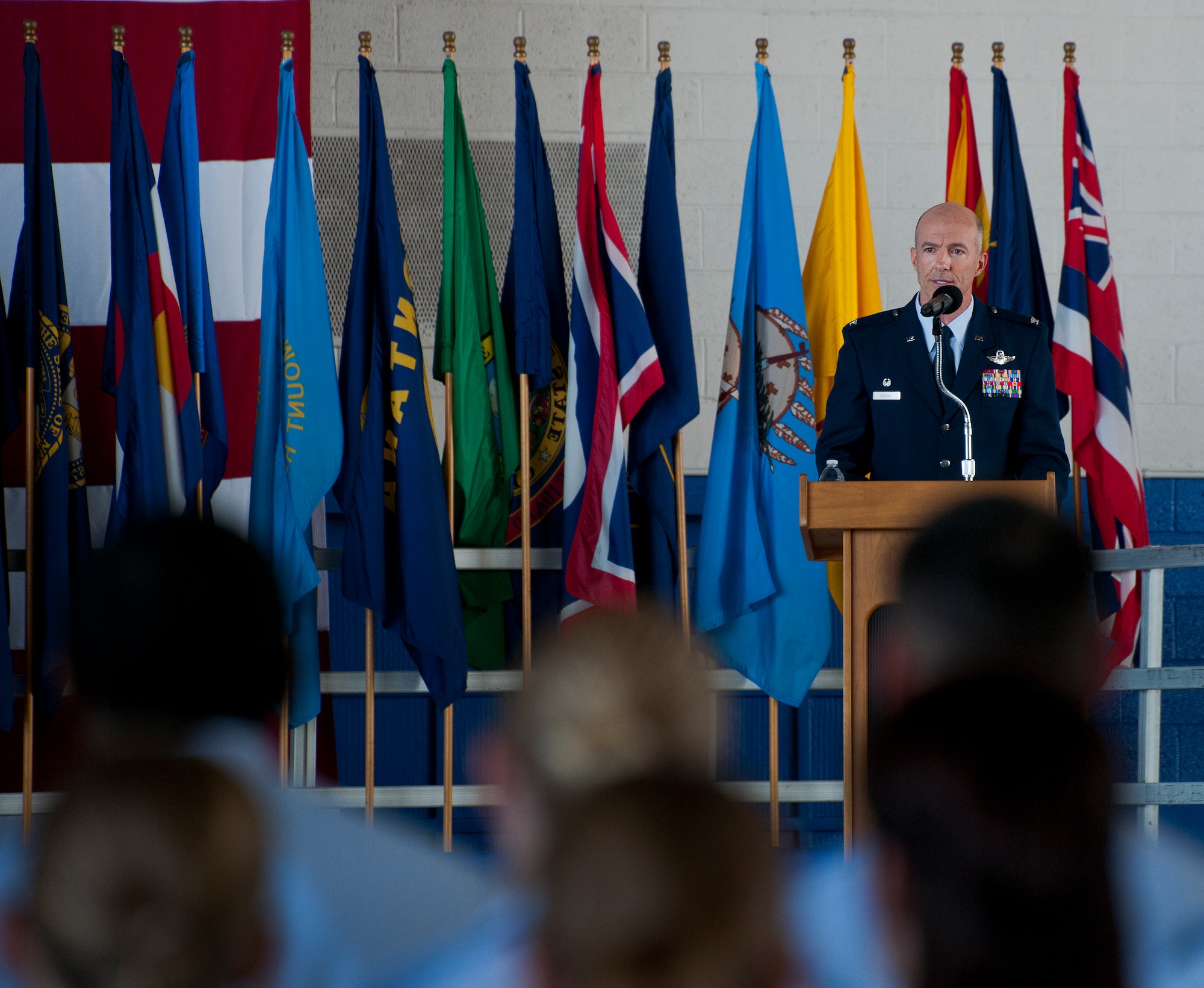 Col. Christopher Azzano speaks to his Airmen for the first time as the commander of the 96th Test Wing during the change of command ceremony June 4 at Eglin Air Force Base, Fla.  Azzano took the reins of the wing from Maj. Gen. David Harris, who leaves to take command of the Air Force Test Center. (U.S. Air Force photo/Samuel King Jr.)
