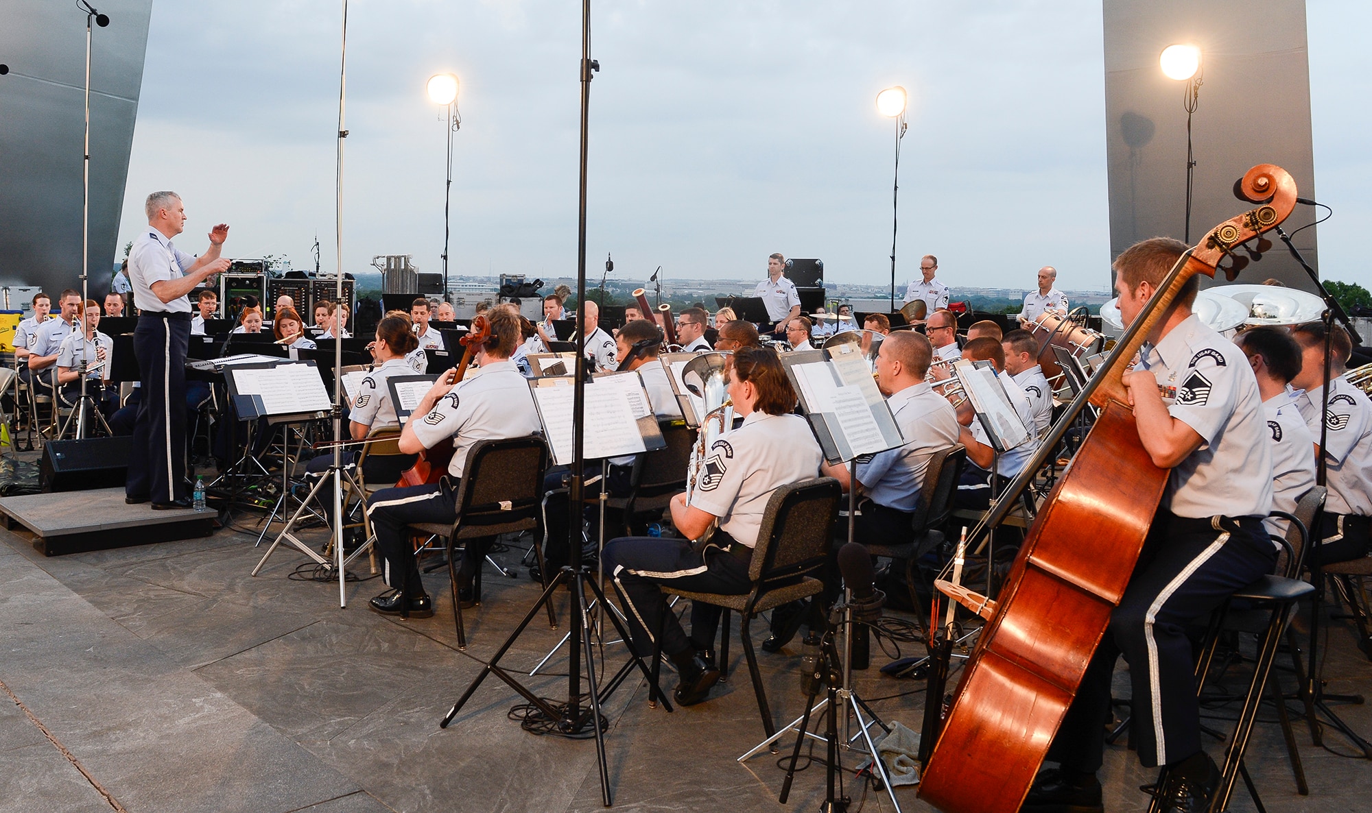 Col. Larry Lang, commander of The United States Air Force Band, conducts the inaugural performance of the 2015 U.S. Air Force Band Summer Concert Series at the Air Force Memorial in Arlington, Va., May 29, 2015. (U.S. Air Force photo/Andy Morataya)