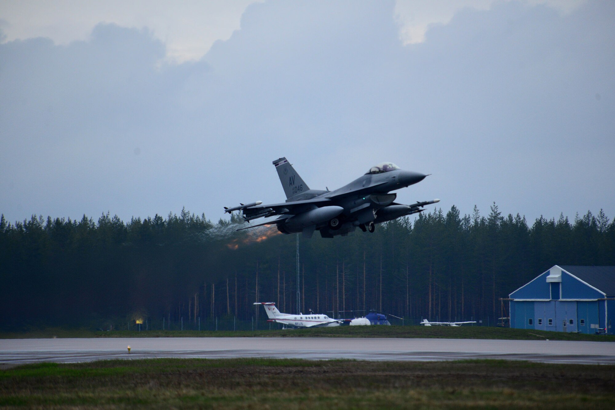 An F-16 Fighting Falcon with the 510th Fighter Squadron from Aviano Air Base, Italy takes off at Kallax Air Base, Sweden, May 26, 2015 during Arctic Challenge Exercise 2015. Nine nations participated in the exercise to help ensure interoperability and strengthen relationships with NATO allies and Partners for Peace. (U.S. Air Force photo by Staff Sgt. Evelyn Chavez/Released)