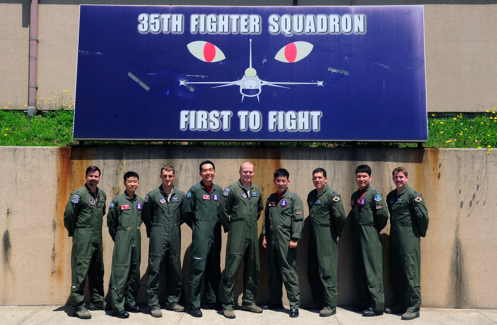 Republic of Korea Air Force pilots from the 123rd Tactical Fighter Squadron, Seosan Air Base, attend a preflight briefing at Kunsan Air Base, ROK, for Exercise Buddy Wing 15-4, June 4, 2015. During the five-day exercise, the 20th FW pilots, maintenance and support personnel are integrating with Wolf Pack Airmen on all aspects of the exercise to include mission planning, briefing, execution and debriefing. (U.S. Air Force photo by Staff Sgt. Nick Wilson/Released)