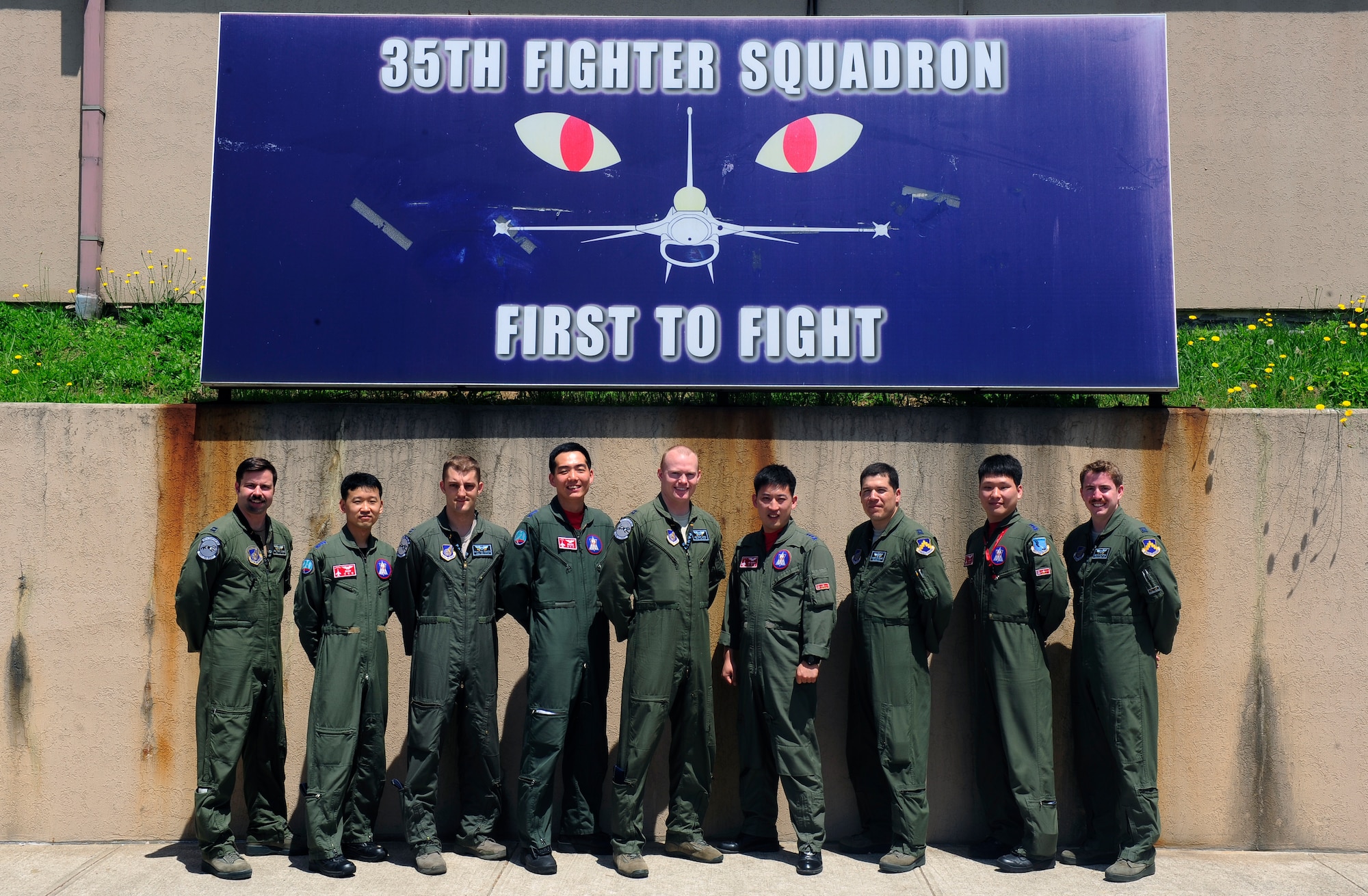 Republic of Korea Air Force pilots from the 123rd Tactical Fighter Squadron, Seosan Air Base, attend a preflight briefing at Kunsan Air Base, ROK, for Exercise Buddy Wing 15-4, June 4, 2015. During the five-day exercise, the 20th FW pilots, maintenance and support personnel are integrating with Wolf Pack Airmen on all aspects of the exercise to include mission planning, briefing, execution and debriefing. (U.S. Air Force photo by Staff Sgt. Nick Wilson/Released)