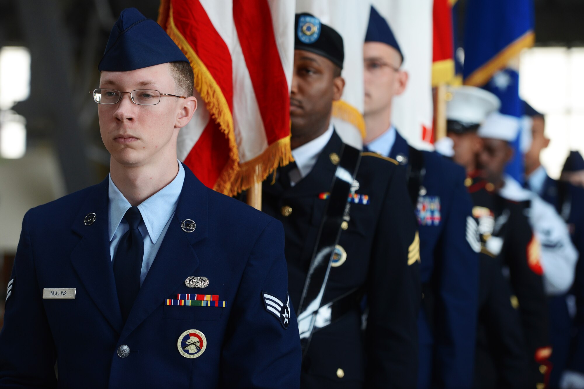 The Joint U.S. Forces, Japan color guard prepares to present the colors during the USFJ and 5th Air Force change of command ceremony June 5, 2015 at Yokota Air Base, Japan. During the ceremony, Lt. Gen. John L. Dolan assumed command of USFJ and 5th AF from retired Lt. Gen. Sam Angelella. (U.S. Air Force photo by Airman 1st Class Delano Scott/Released)

