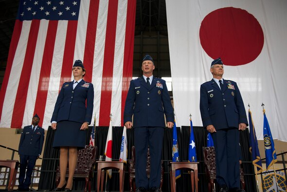 Gen. Lori J. Robinson, Pacific Air Force commander, left, Lt. Gen. John L. Dolan, U.S. Forces Japan and 5th Air Force commander, center, and Lt. Gen. Sam Angelella, former U.S. Forces Japan and 5th Air Force commander participate in a change of command ceremony as Angelella transfers leadership to Dolan June 5, 2015, at Yokota Air Base, Japan. (U.S. Air Force photo by Airman 1st Class Delano Scott/Released)

