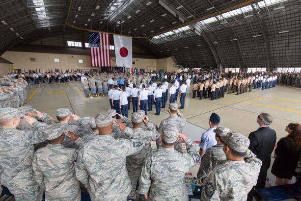 Yokota service members salute during the United States Forces Japan and 5th Air Force
change of command ceremony at Yokota Air Base, Japan, June 5, 2015. Lt. Gen. John Dolan assumed command of the USFJ and 5th AF from Lt. Gen. Sam Angelella. (U.S. Air Force photo by Osakabe Yasuo/Released)