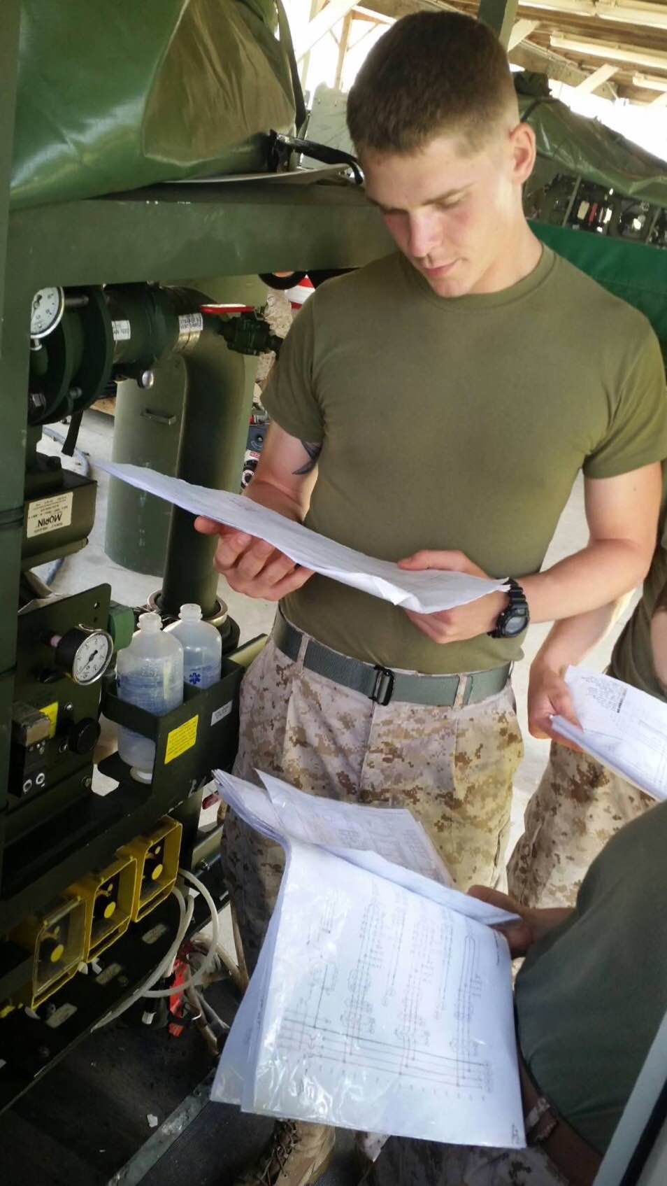 Marines from AEEEST 2-15 conduct practical application on repairing TWPS.