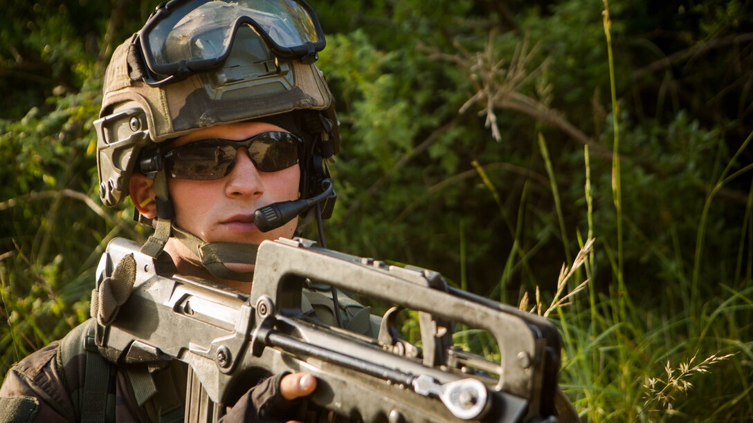 A service member with the French Foreign Legion’s 6th Light Armored Brigade posts security during a training exercise on Quartier Colonel de Chabrieres, France, May 29, 2015. U.S. Marines with Special-Purpose Marine Air-Ground Task Force Crisis Response-Africa stationed at Moròn Air Base, Spain, conducted a simulated seize and capture training exercise with the French infantrymen to further improve interoperability between the two NATO forces as they concurrently deploy their service members to Africa. 