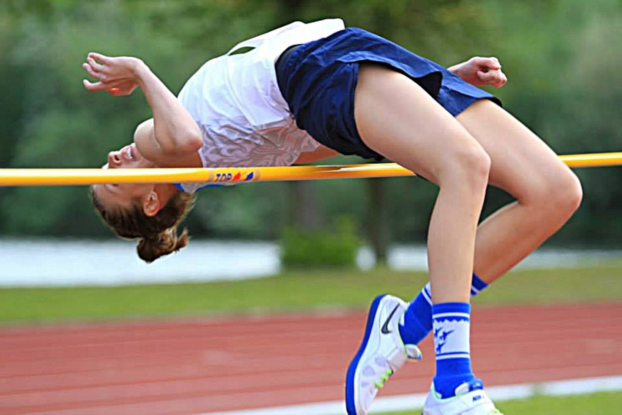 Second Lt. Rachel Herald, 90th Logistics Readiness Squadron installation deployment officer at F.E. Warren Air Force Base, Wyo., clears the high bar during a jump in the Headquarters Allied Air Component Command Track and Field Championship held recently. Herald won the high jump for the women’s category with a jump of 5 feet 4 inches. (Courtesy photo)