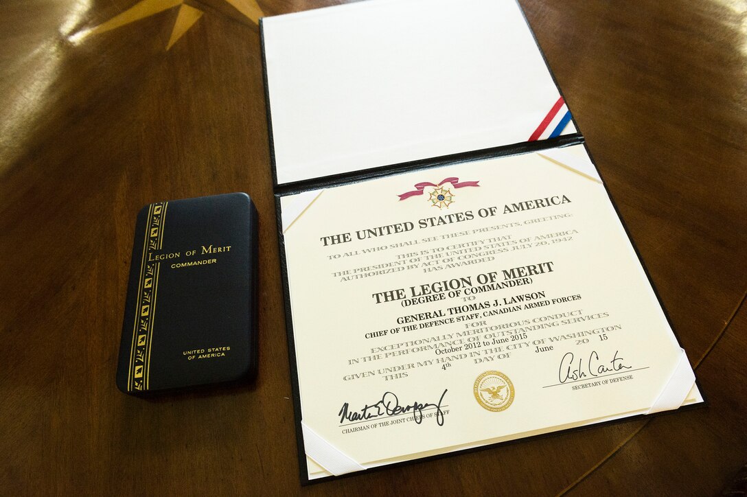 A Legion of Merit award lays on a table during a presentation for Canadian Air Force Gen. Thomas J. Lawson, chief of the defense staff of Canada's armed forces, during the U.S.-Canada Defense Chiefs Strategy Dialogue at the National Defense University in Washington, D.C., June 4, 2015. 