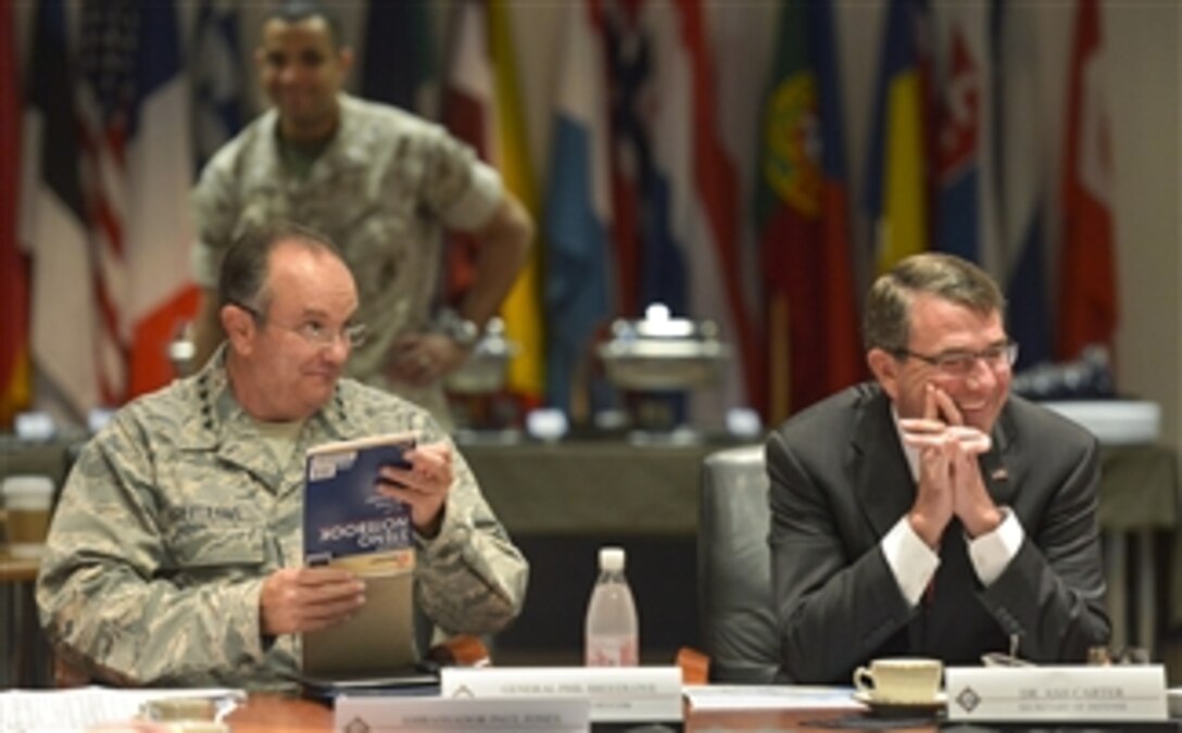 U.S. Defense Secretary Ash Carter smiles as U.S. Air Force Gen. Philip M. Breedlove, NATO’s supreme allied commander for Europe and commander of U.S. European Command, introduces him during a high-level meeting with regional defense leaders in Stuttgart, Germany, June 5, 2015. Carter's visit to Germany was the last stop on a 10-day trip, which also included meetings with leaders and troops in Hawaii, Singapore, Vietnam and India.