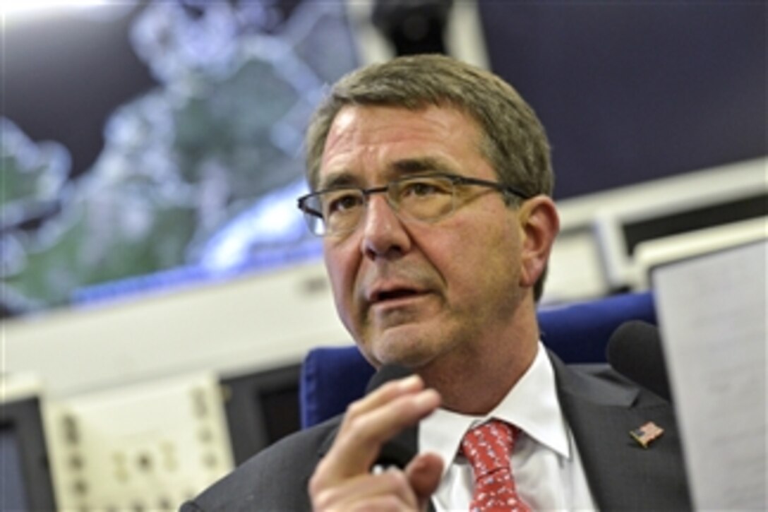 U.S. Defense Secretary Ash Carter briefs reporters while flying from Stuttgart, Germany, June 5, 2015, to Joint Base Andrews, Md., ending a 10-day trip to meet with leaders and troops in Hawaii, Singapore, Vietnam, India and Germany.