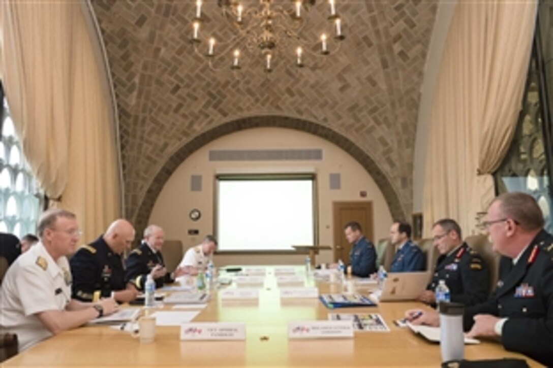 U.S. Army Gen. Martin E. Dempsey, third from left, chairman of the Joint Chiefs of Staff, hosts Canadian defense leaders for the U.S.-Canada Defense Chiefs Strategy Dialogue, at the National Defense University in Washington, D.C., June 4, 2015.  