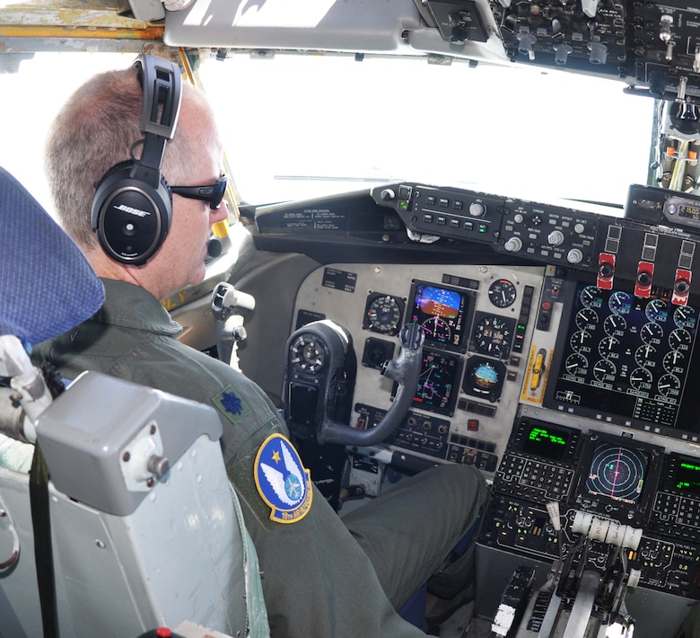 Lt. Col. Eric Vitosh, 18th Air Refueling Squadron commander, pilots a KC-135 Stratotanker during bosslift sponsored by the local Employer Support of the Guard and Reserve (ESGR) here, June 6, 2015.  The flight was also Vitosh's final flight as the commander of the 18 ARS.  (Tech. Sgt. Abigail Klein)
