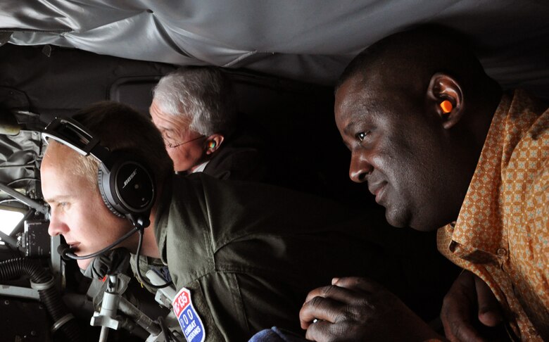 (Left to right) Master Sgt. Michael Stahl, 18th Air Refueling Squadron boom operator, refuels a B-52 Stratofortress operated by Reservists from the 307th Bomb Wing out of Barksdale Air Force Base, La., while Jimmy Jordan, BNSF trainmaster looks on, during   a "bosslift" sponsored by the local Employer Support of the Guard and Reserve (ESGR), June 6, 2015.  More than 19 local employers participated in the flight. (U.S. Air Force photo by Capt. Zachary Anderson)